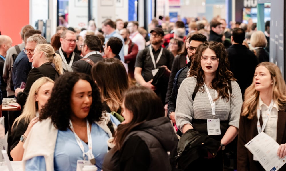 Learning Technologies 2026 exhibition floor with L&D professionals and LMS vendors
